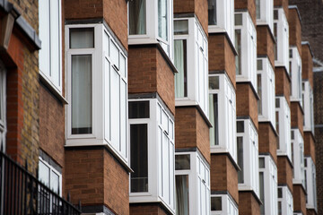 Fototapeta na wymiar Perspective of old apartment buildings in London