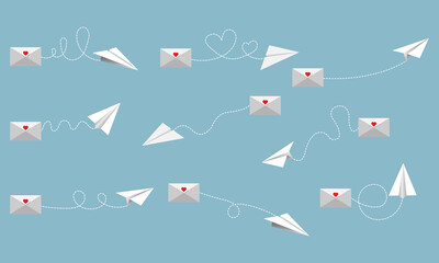 Flying paper airplane with dotted air route and envelope. Heart shaped.Paper planes with hearts.Set of envelopes,mail envelopes.Love card. - obrazy, fototapety, plakaty