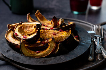 Roasted acorn squash with pomegranate seeds 