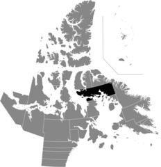 Black flat blank highlighted location map of the AGGU District inside gray administrative map of the territorial electoral districts of Canadian territory of Nunavut, Canada