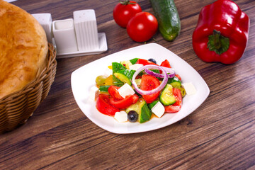 Healthy food Greek Salad with fresh vegetables, diet portion