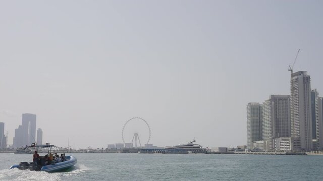 Speedboat Heading Towards Dubai Eye and the Marina