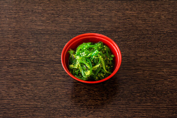 Wakame is an edible seaweed. In Japan it is used in the preparation of miso soup. It is included in the list of the 100 most harmful invasive alien species in the world