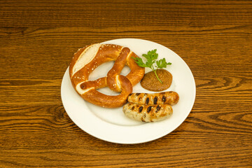 White sausage, or Muenchner Weißwurst in German, is one of the gastronomic specialties of Bavaria, in most German restaurants they serve the sausage accompanied by sweet mustard and a bretzel