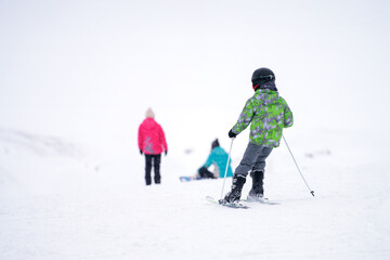 A young skier on a ski track. Selective focus. Copy space.