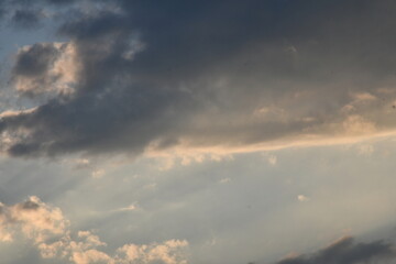 evening sky Shadows of clouds that are shattered by the orange sunlight