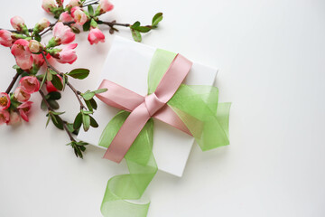 greeting card design. gift concept. gift box and  flowers on a white background. invitation. congratulation
