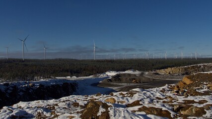 Eco power. Wind turbines generating electricity in Skelleftea, North of Sweden