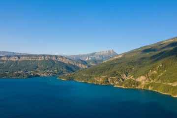 The Lac de Castillon with its banks in Europe, in France, Provence Alpes Cote dAzur, in the Var, in summer, on a sunny day.