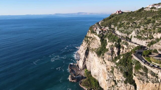 Aerial Drone View of Sorrento, near Naples, Italy.  View of the Beach and Beautiful Blue Ocean. Aerial drone view of a mountain road along the blue sea.