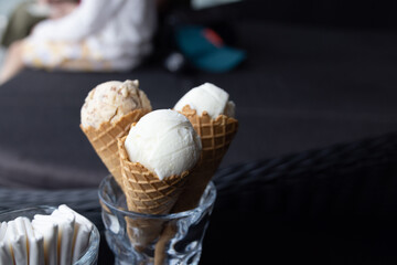 Three icecream cone in cup. Concept for food and dessert.