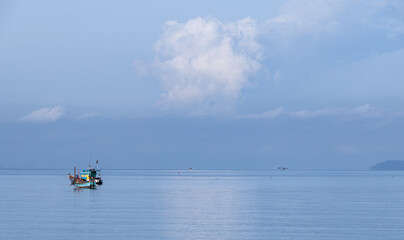 panorama fishing boats in the calm blue sea. Concept of natural and Thailand view.