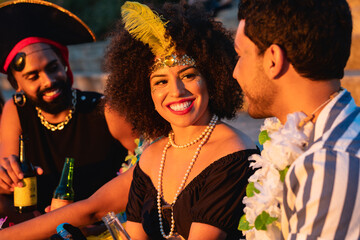 Carnival Party in Brazil, brazilian woman talking to friend at parade festival dressed.