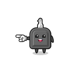 car key cartoon with pointing left gesture