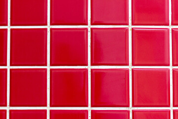 colored tiles in red color on a wall of rio de janeiro.