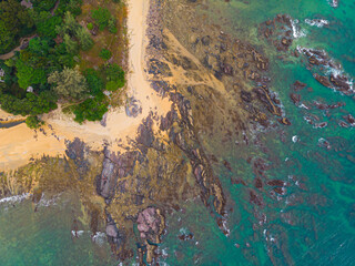 Aerial drone view of calm seascape and beautiful beach at Tanjung Jara, Dungun, Terengganu, Malaysia.