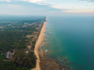 Aerial drone view of calm seascape and beautiful beach at Tanjung Jara, Dungun, Terengganu, Malaysia.