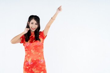 beauty woman wear cheongsam and smile to you in chinese new year
