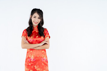 beauty woman wear cheongsam and smile to you in chinese new year