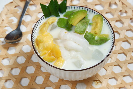 Ice Teler Or Es Teler-indonesian Fruit Cocktail,Avocado, Young Coconut, Jackfruit, Served With Coconut Milk, Sweetened Condensed Milk.