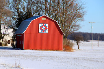red barn in snow