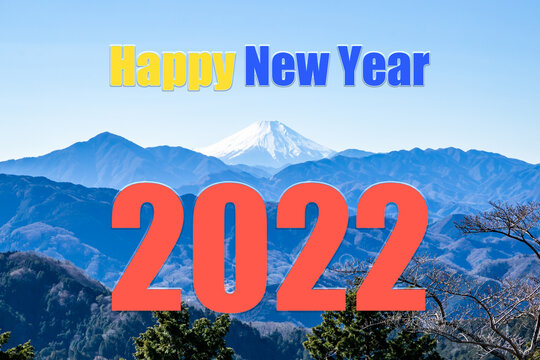 happy new year 2022 with a picture of snow covered mount fuji background