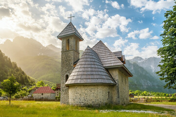 Christian Church in the village of Theth in Prokletije Mountains, Albania. - obrazy, fototapety, plakaty