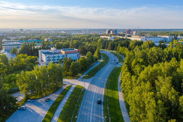 Fototapeta premium Aerial view of Akademgorodok town near the city of Novosibirsk in summer at sunset