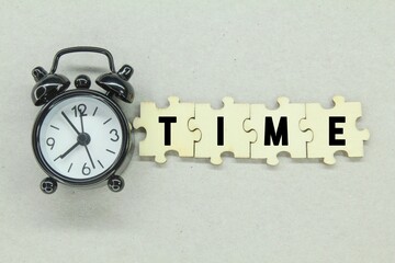 alarm clocks and Puzzles with the word Time