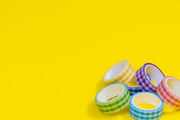 Colorful stationary school supplies on yellow trending background with copyspace or text flat lay. Colorful Education or back to school Concept