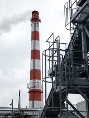 Obraz premium Pipe at the factory. View of the industrial zone .