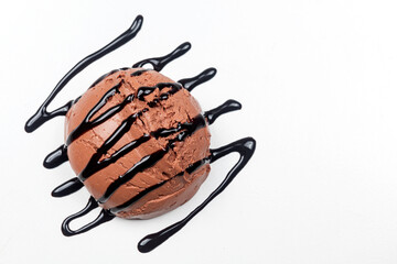 Chocolate ice cream with chocolate sauce