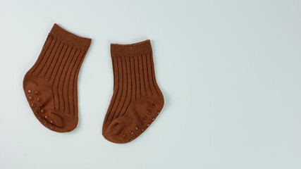 a pair of cute little baby socks isolated on white background