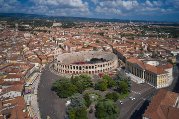 Obraz premium Verona, Italy aerial view of the historic city. Famous amphitheater in Italy aerial view. Aerial panorama of Piazza Bra in Verona. Monument to Unesco Arena di Verona top view.