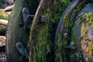 The mechanisms of the old mill on the stream. 