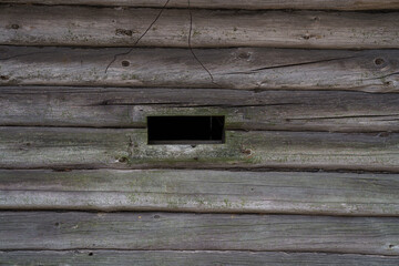 Window in an old wooden house. 