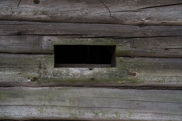 Window in an old wooden house. 