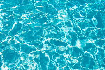 Tansparent clear calm water surface texture. Abstract nature background. Sea water pattern.