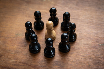 Opinion leader. Followers on social media concept. Chess pieces on a wooden background