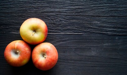 apples on wooden table