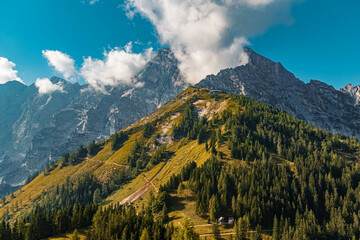 Beautiful alpine summer view with the famous Hoher Goell summit resembling a volcano at the Purtschellerhaus near Berchtesgaden, Bavaria, Germany
