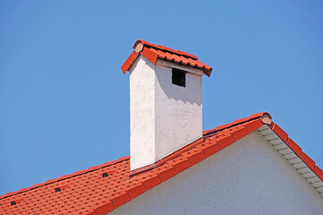  house from a red brick with a pipe