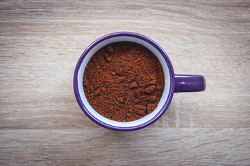Ground coffee in a coffee cup