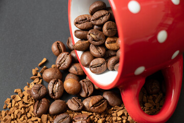 granulated coffee and grains in a cup sprinkled on a dark background, coffee