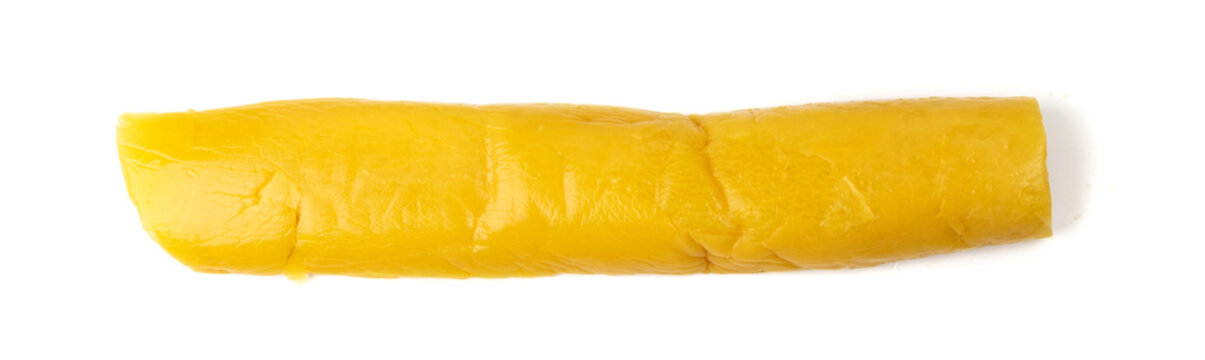 Pickled Daikon Bars Isolated, Marinated Yellow Radish