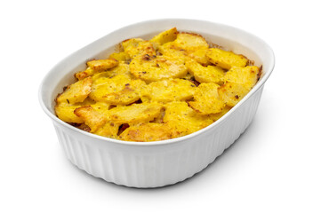 Baked potatoes in ceramic dish. Isolated on white.