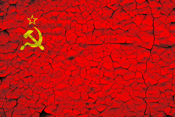 the Union of Soviet Socialist Republics (USSR) flag painted over cracked concrete wall
