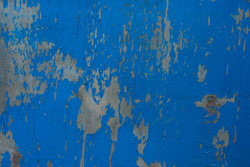 Fototapeta premium Wooden backdrop with copy space. Old blue painted wood texture surface with many scratches and scrapes as natural background.