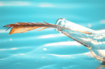 Closeup of Bottle with Feather