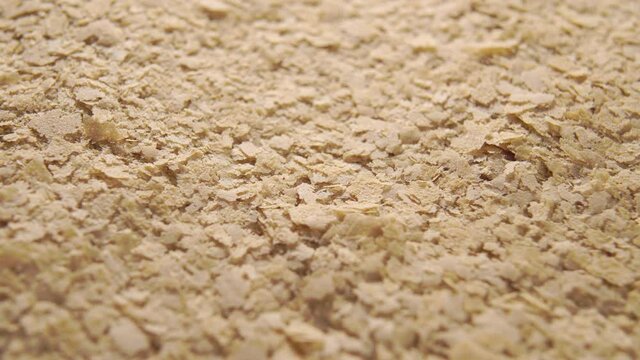 Nutritional brewers yeast flakes. Macro. Rotation